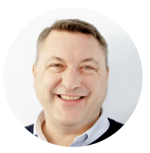 Smiling man with short hair